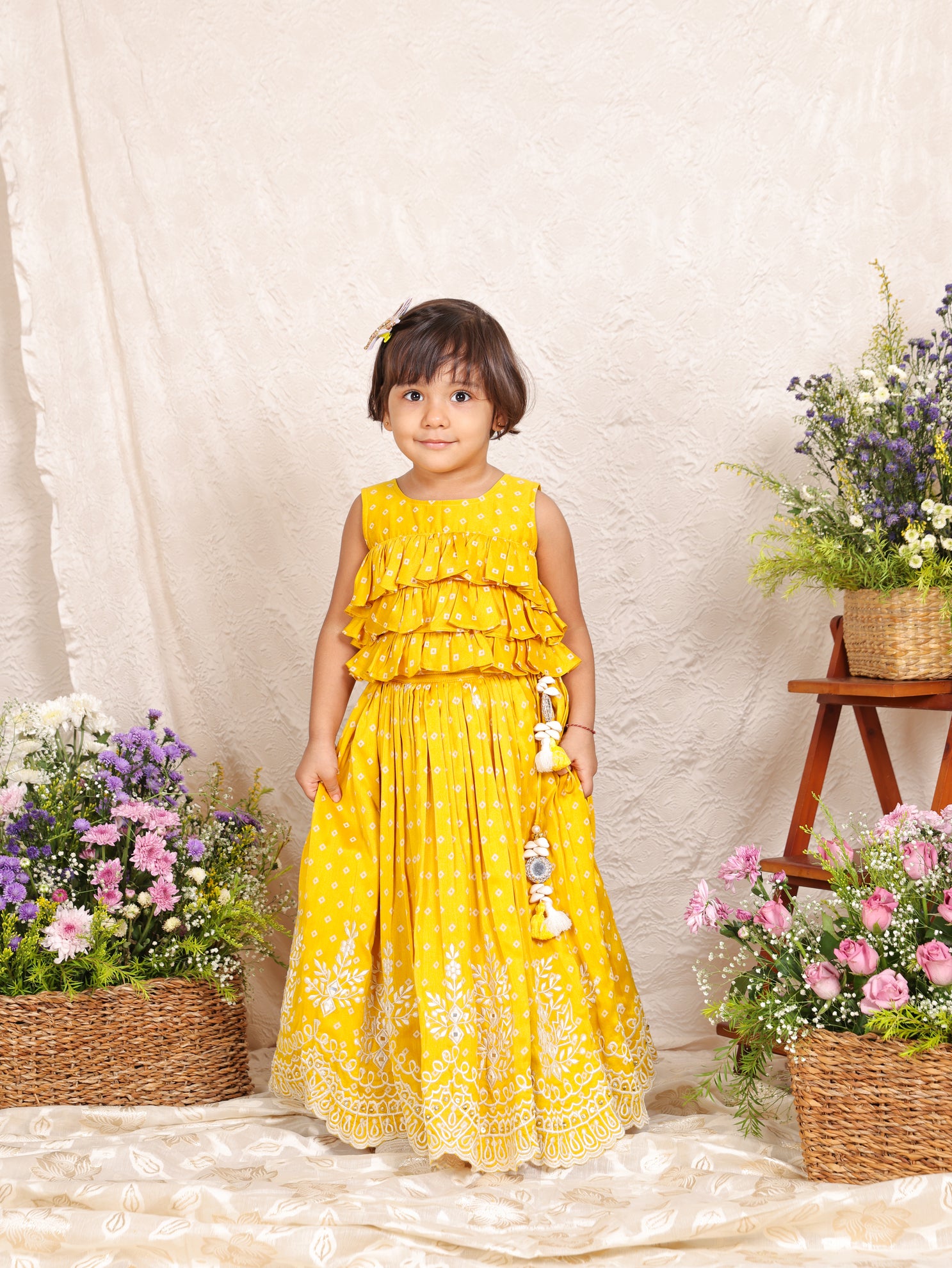 Yellow Bandhej Ruffle Top And Thread embroidered Ghagara