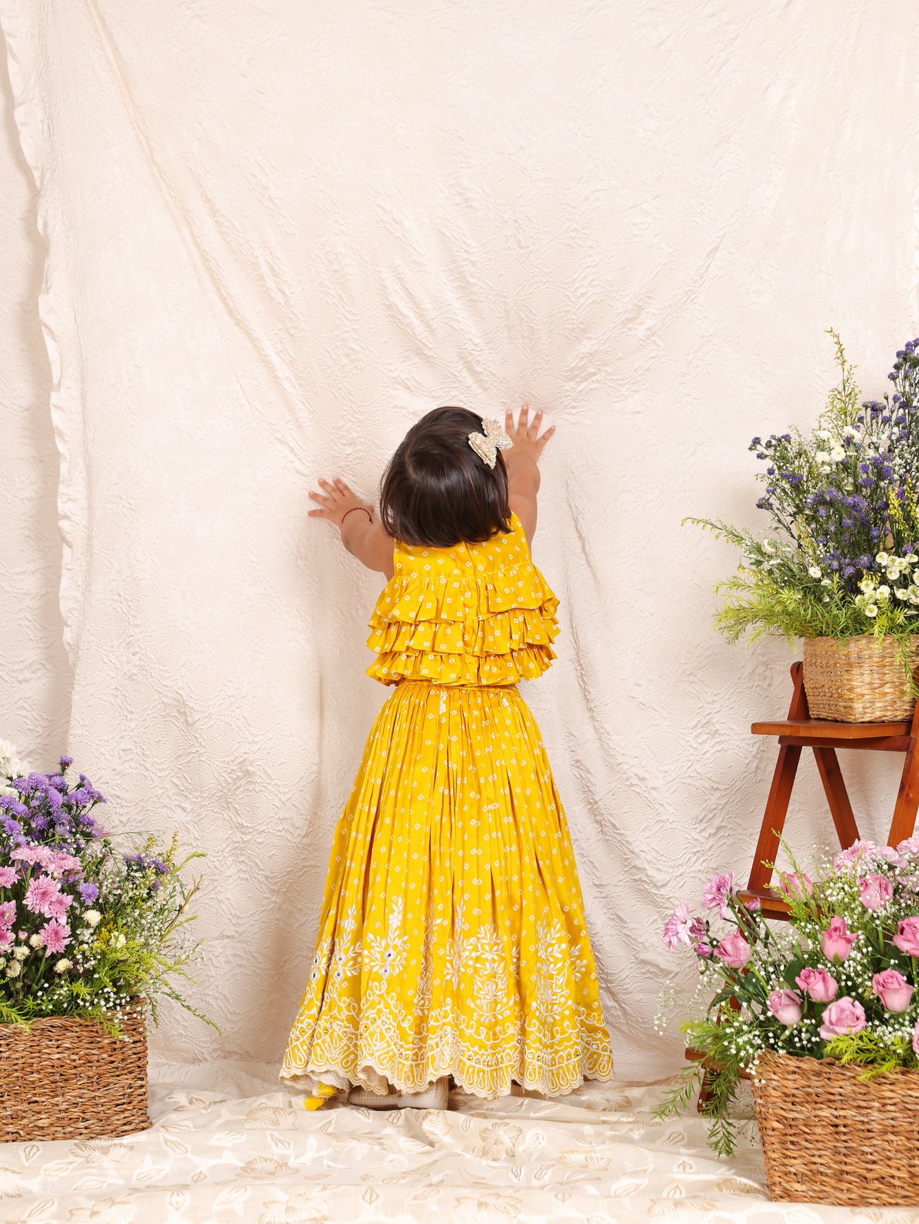 Yellow Bandhej Ruffle Top And Thread embroidered Ghagara
