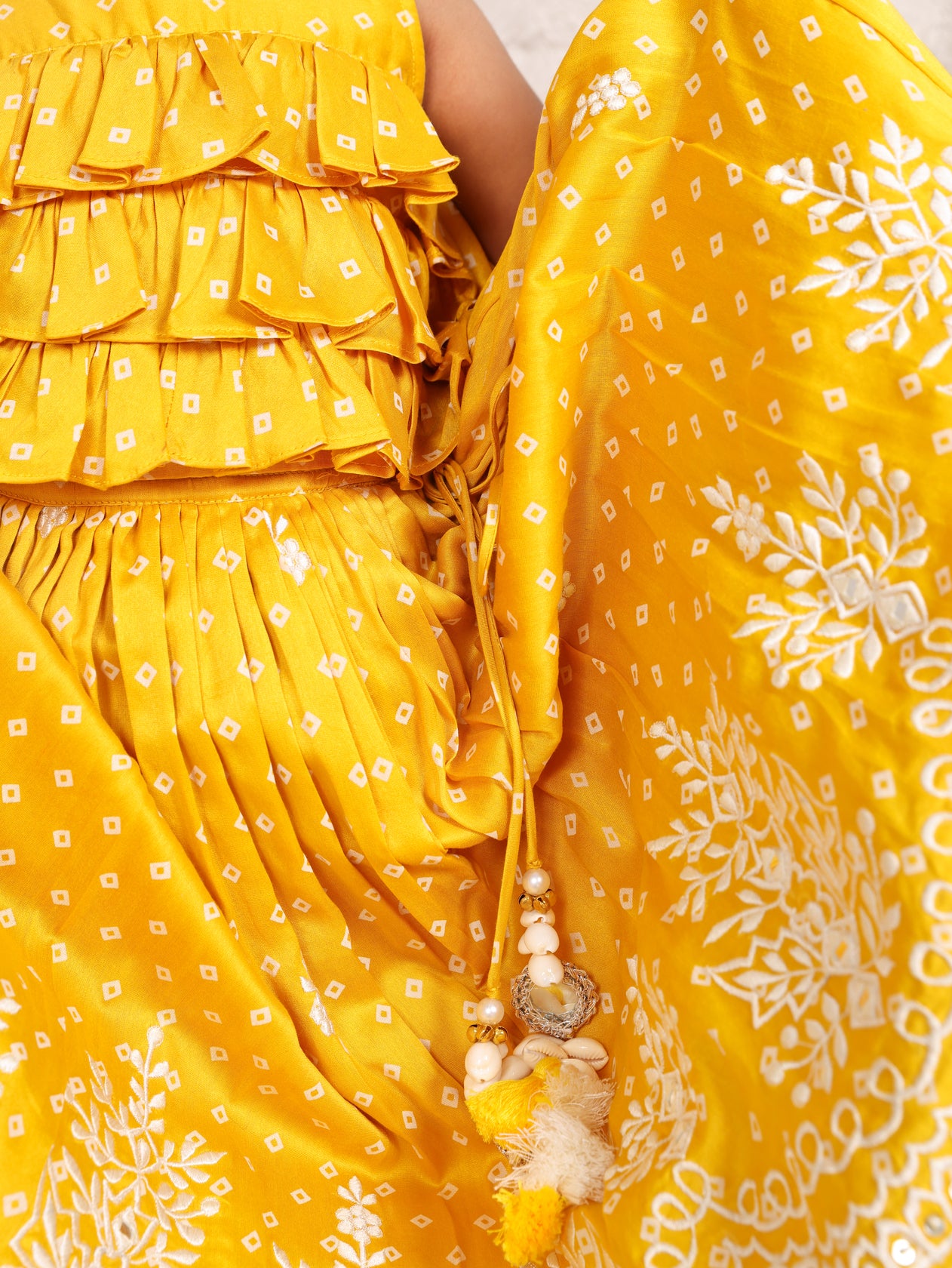Yellow Bandhej Ruffle Top And Thread embroidered Ghagara