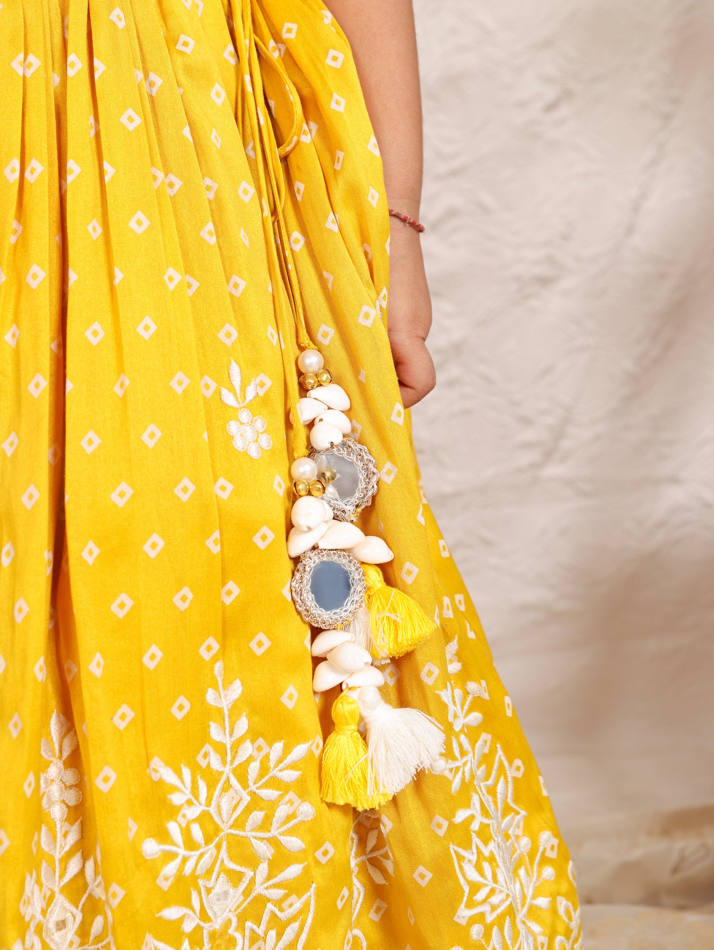 Yellow Bandhej Ruffle Top And Thread embroidered Ghagara