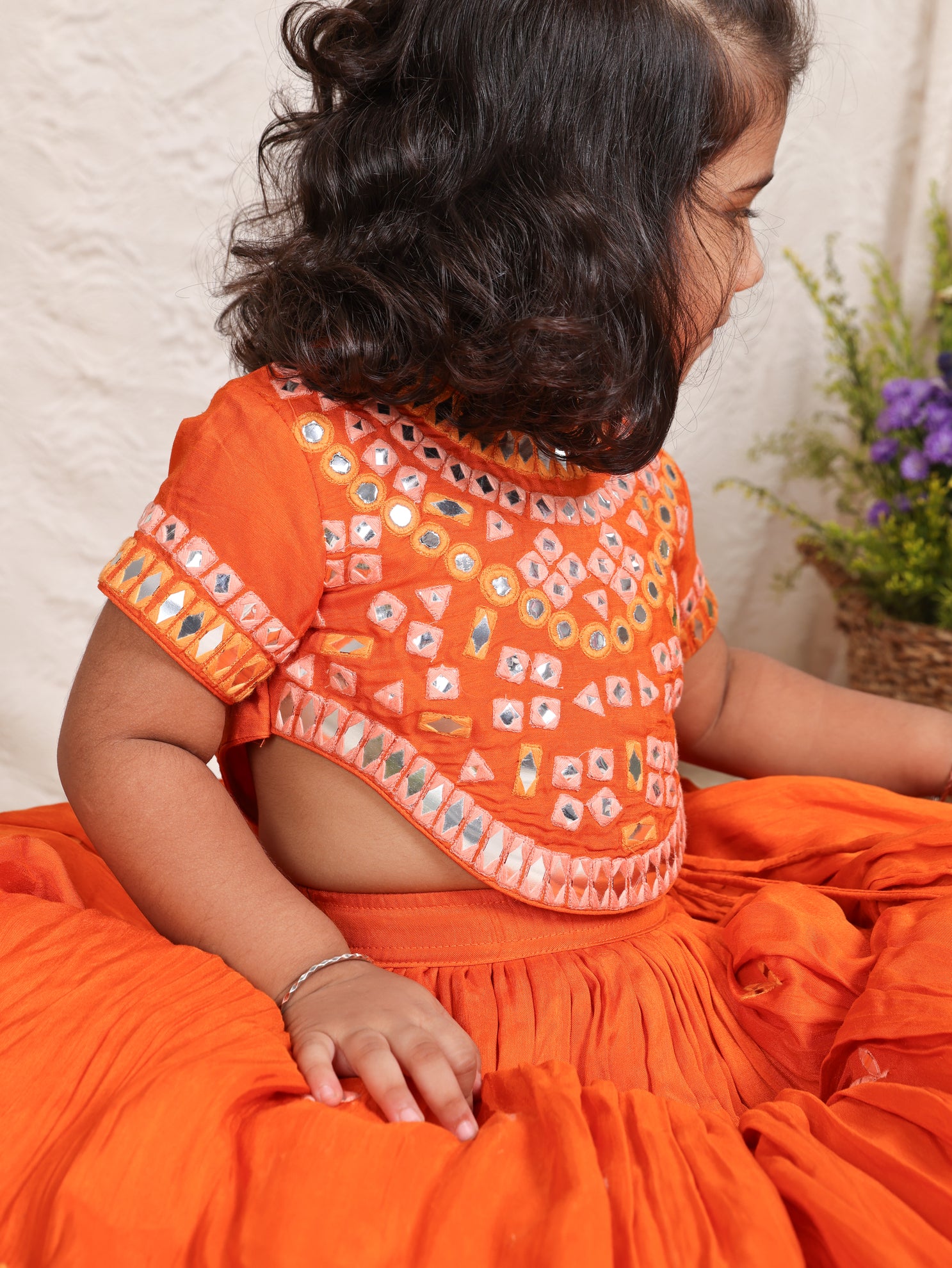 Multicolour Thread And Faux Mirror Embroidered Orange Ghaghra and Blouse