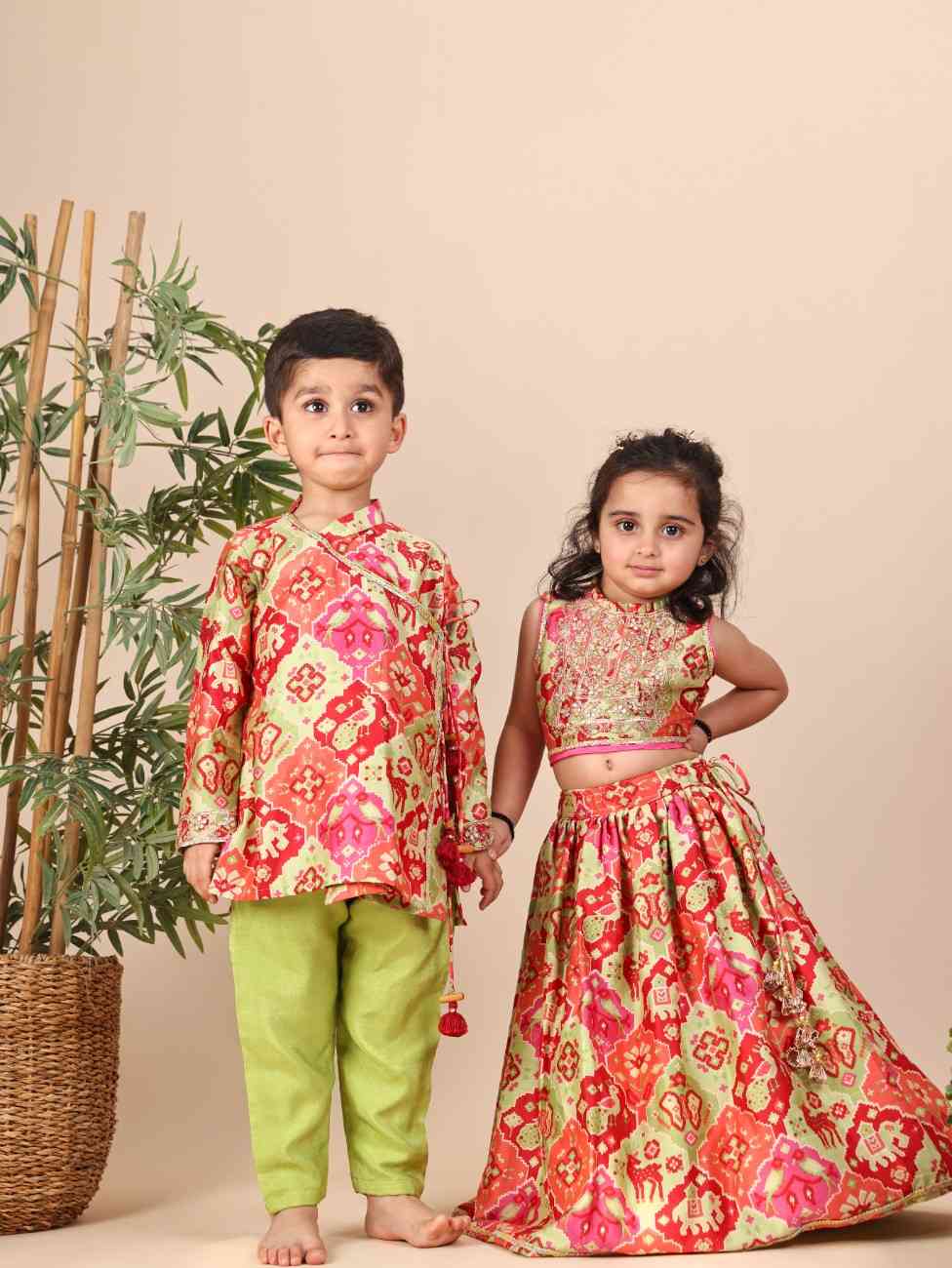 Gota and Zari Embroidered Green Patola Printed Angrakha and Pant