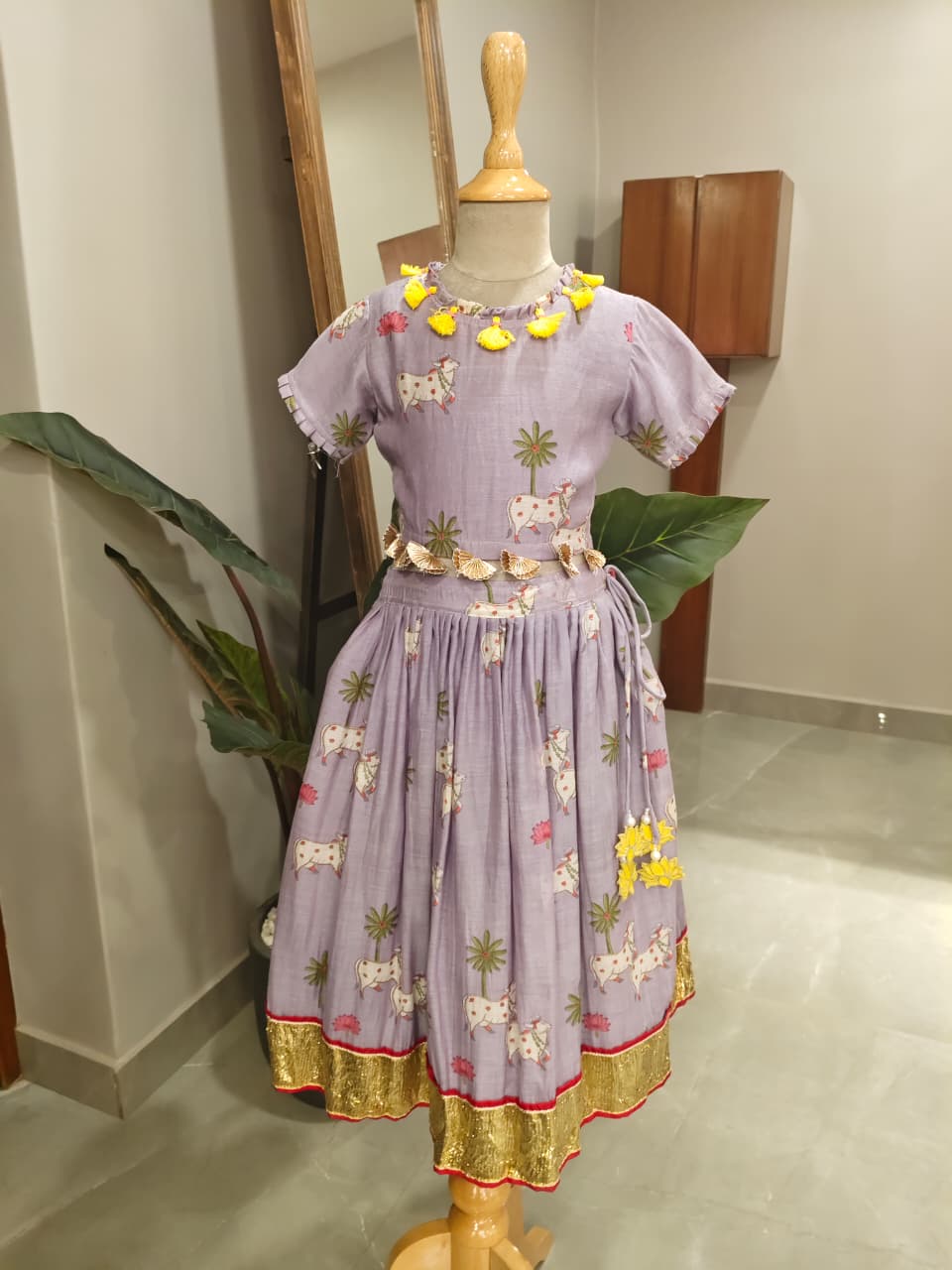 Adorable Printed Top With Fringed Detailing And Lehenga