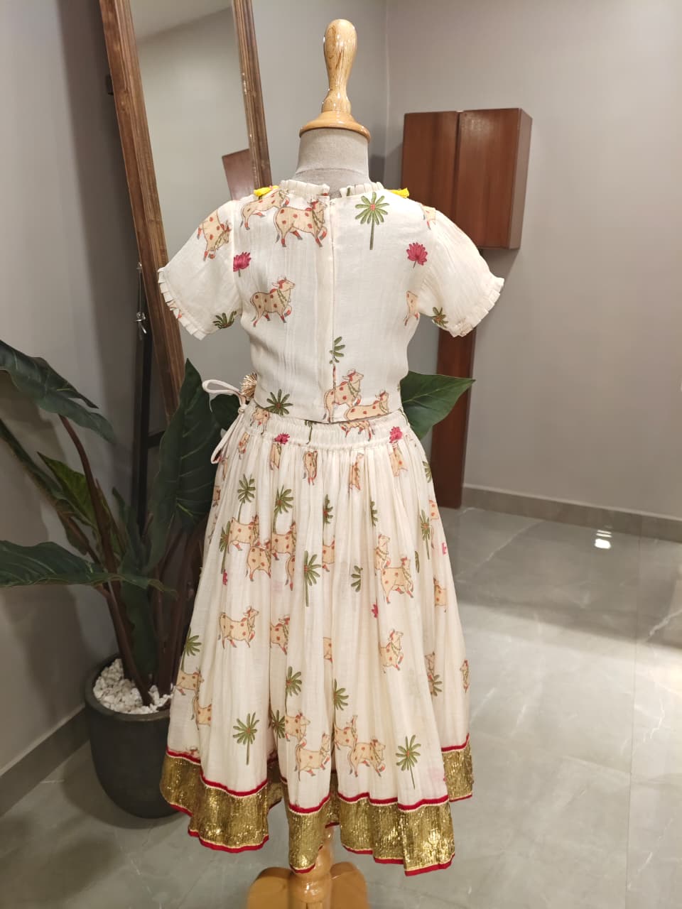 Adorable Printed Top With Fringed Detailing And Lehenga