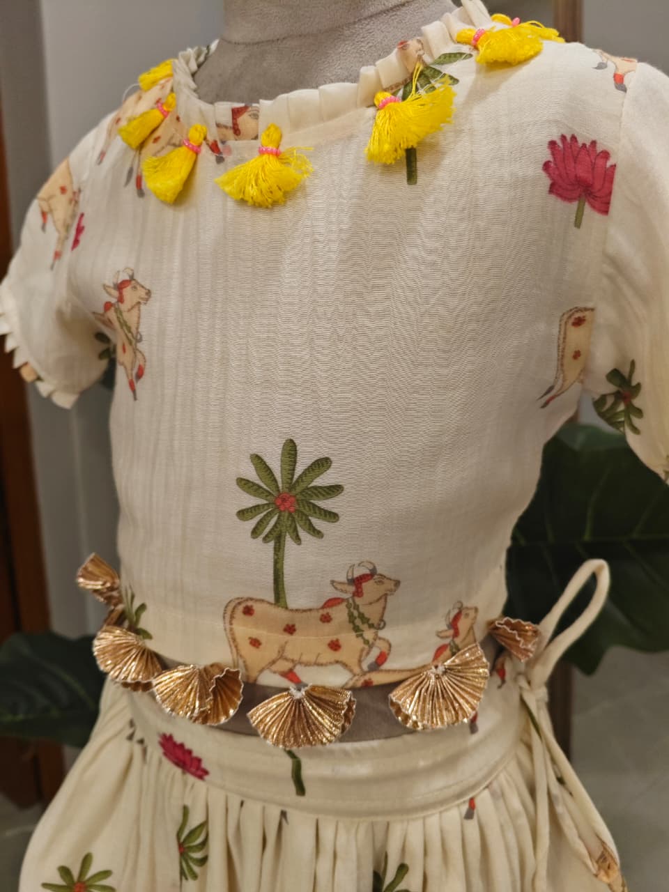 Adorable Printed Top With Fringed Detailing And Lehenga