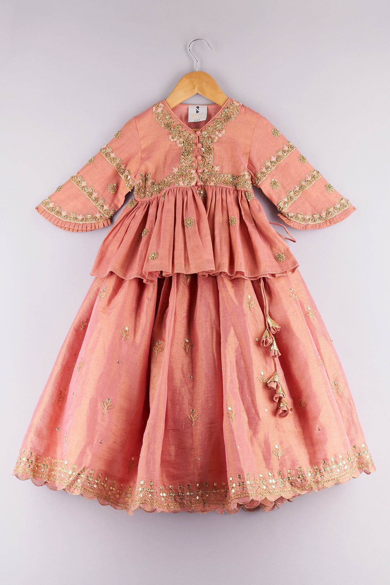 Sequence and zari work pink peplum top with embroidered lehenga