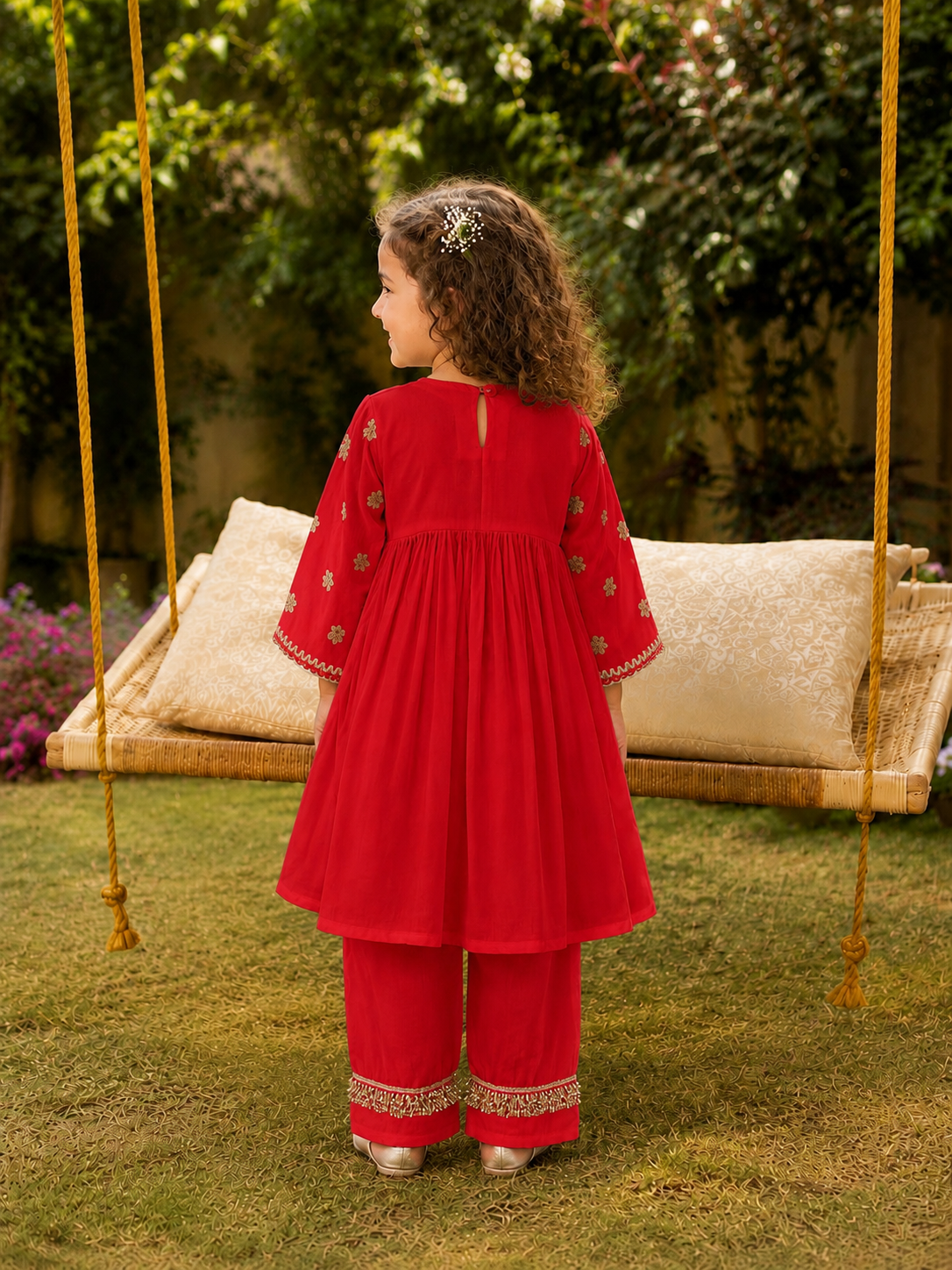 Red embroidered peplum kurta pants and potli