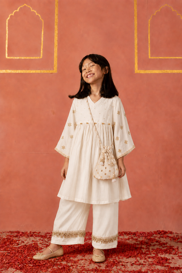 White embroidered peplum kurta pants and potli