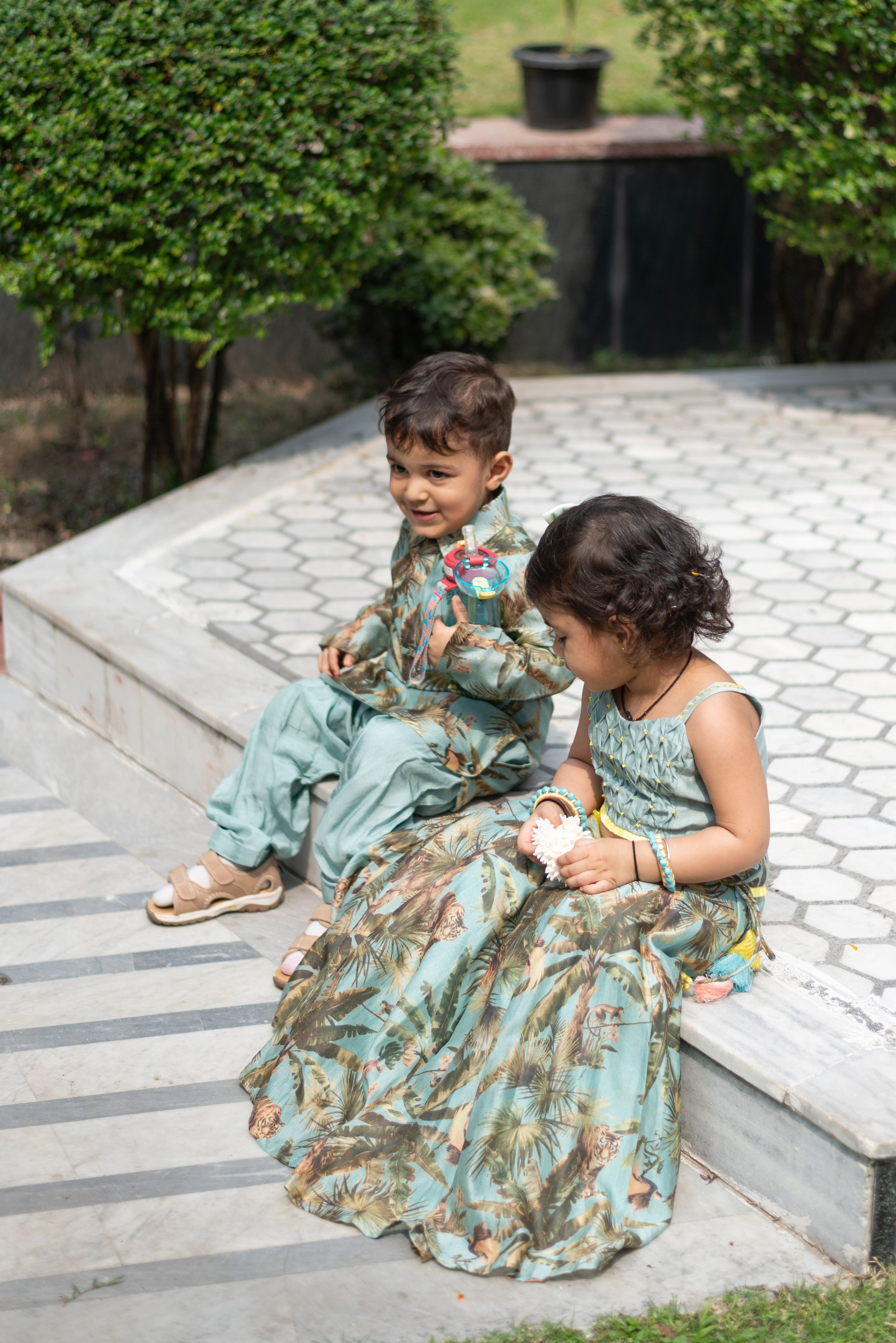 Fringed Hem Pin Tuck Green Top And Printed Lehenga