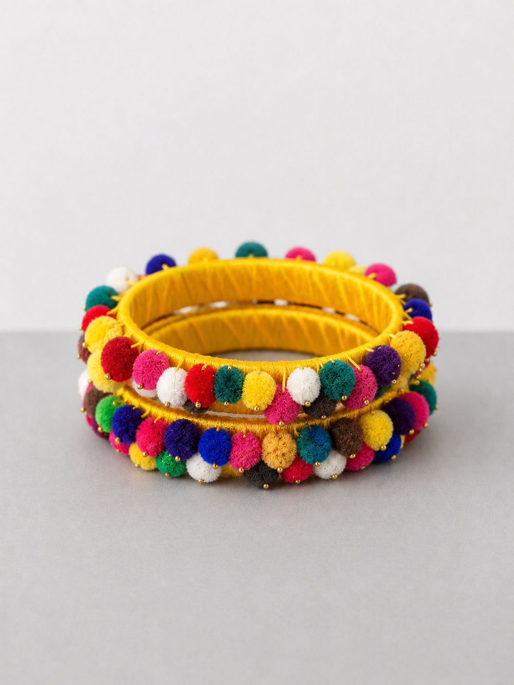Yellow Pompom Bangles