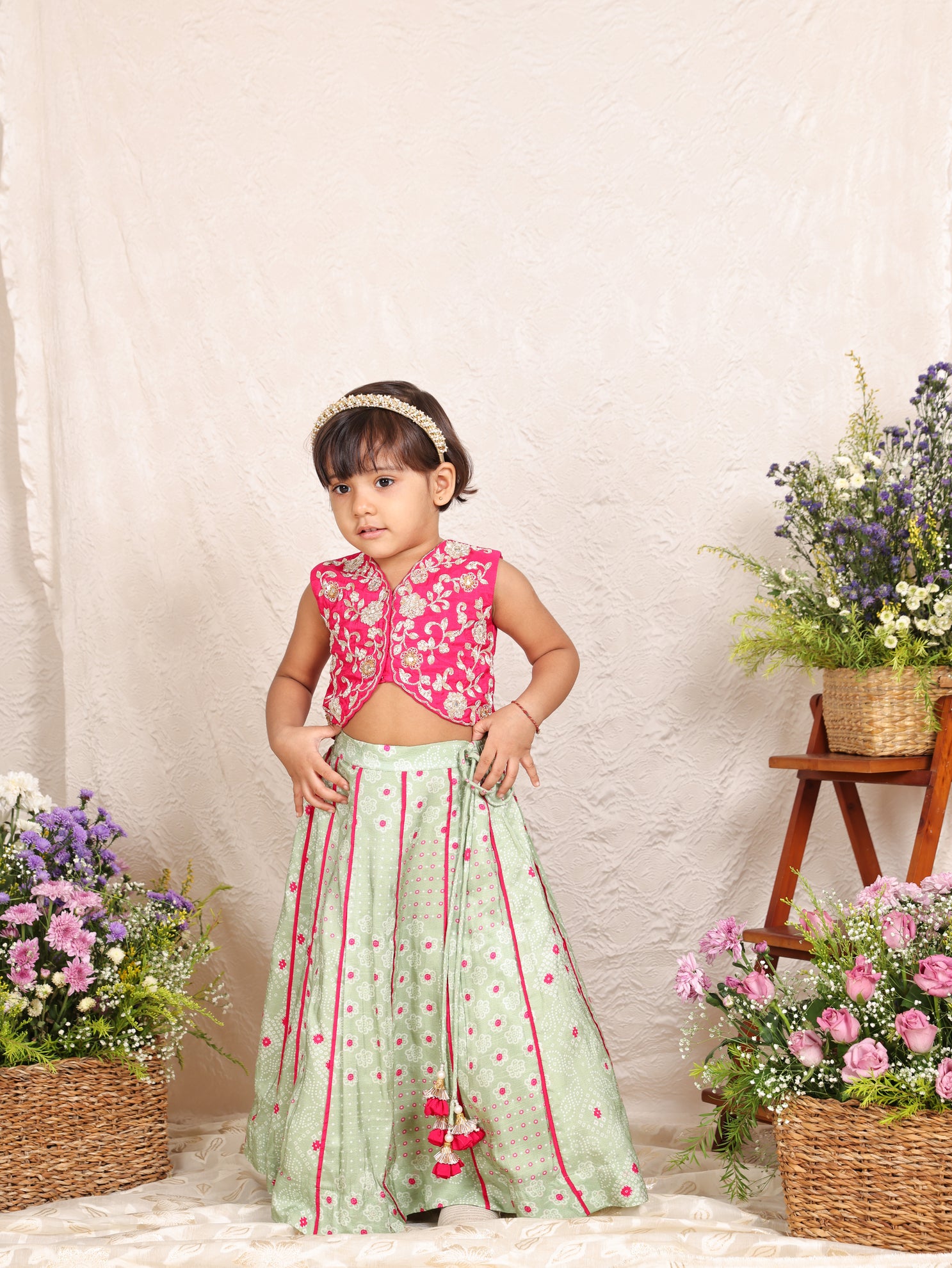 Hot Pink Embroidered Blouse and Pista Green Bandhej Ghaghra