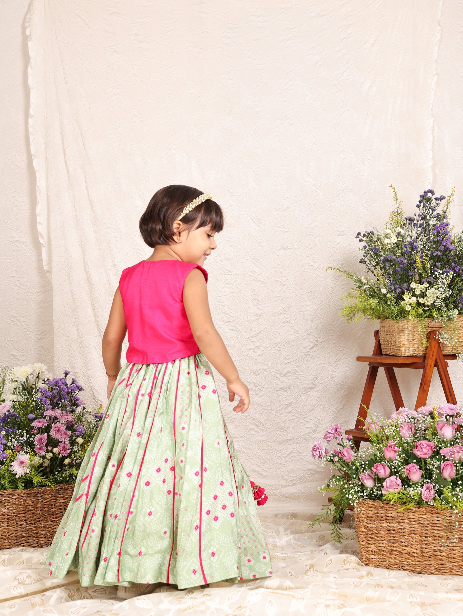 Hot Pink Embroidered Blouse and Pista Green Bandhej Ghaghra