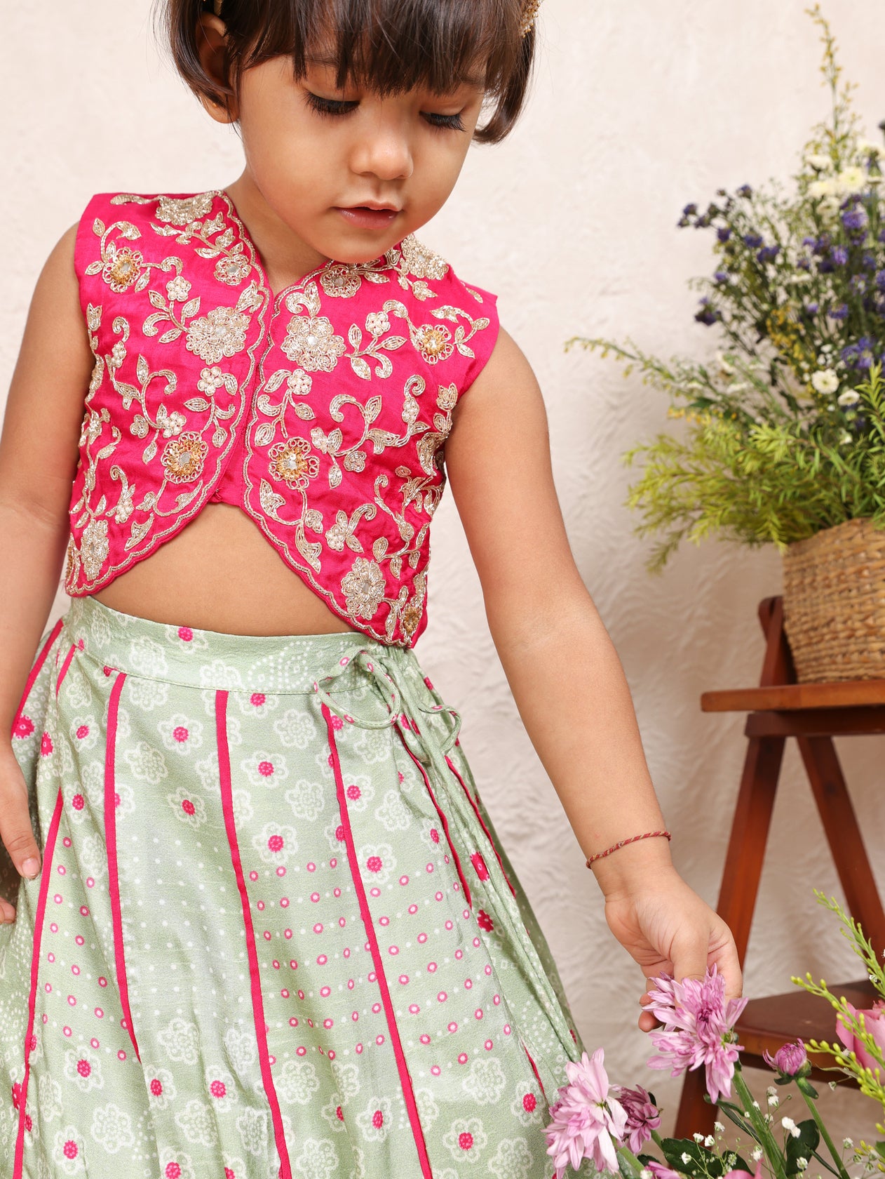 Hot Pink Embroidered Blouse and Pista Green Bandhej Ghaghra