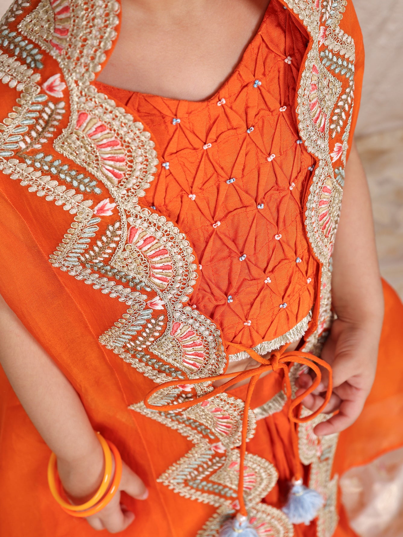 Orange Cape with Smocked Top and Ghaghra