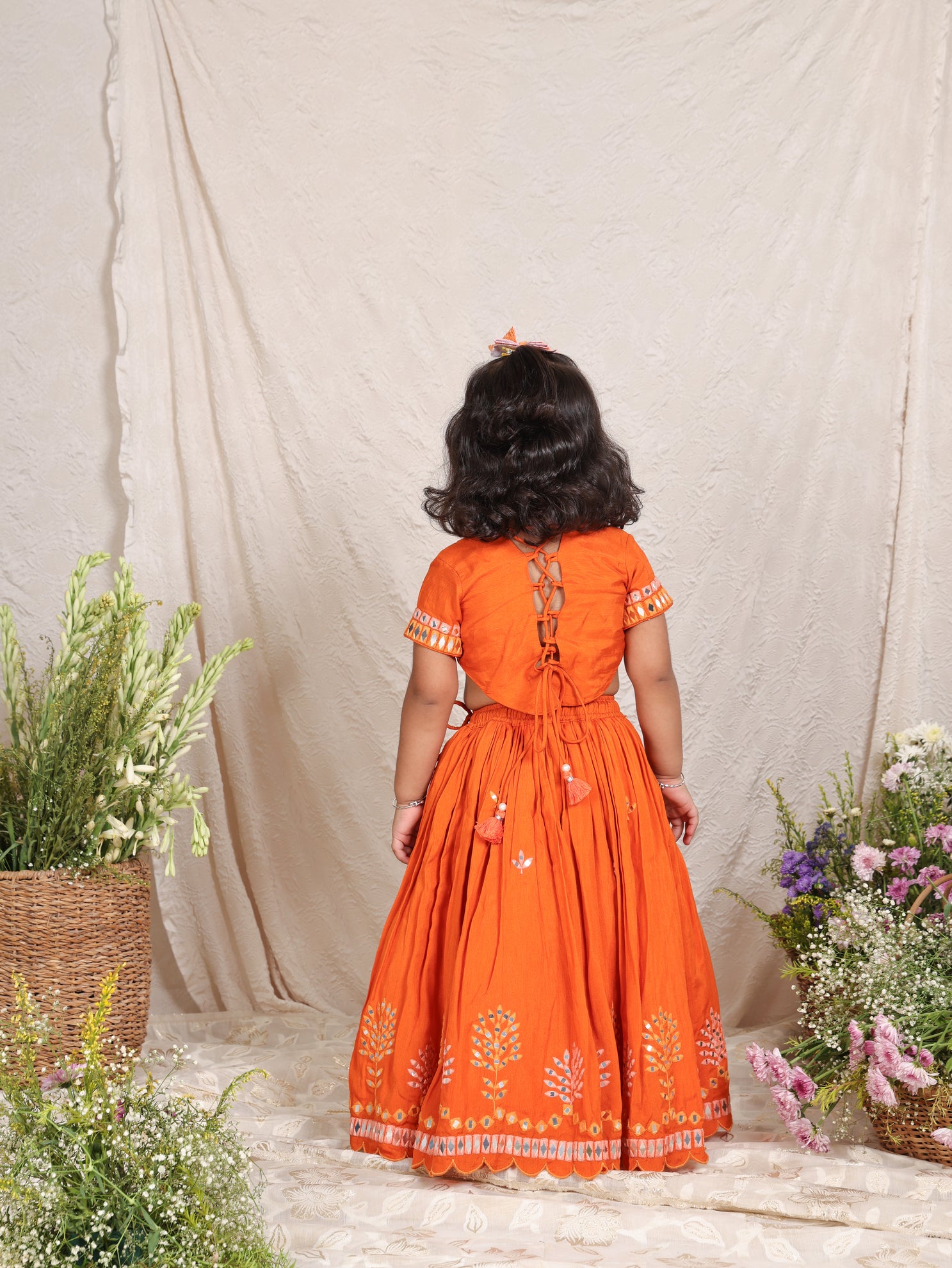 Multicolour Thread And Faux Mirror Embroidered Orange Ghaghra and Blouse