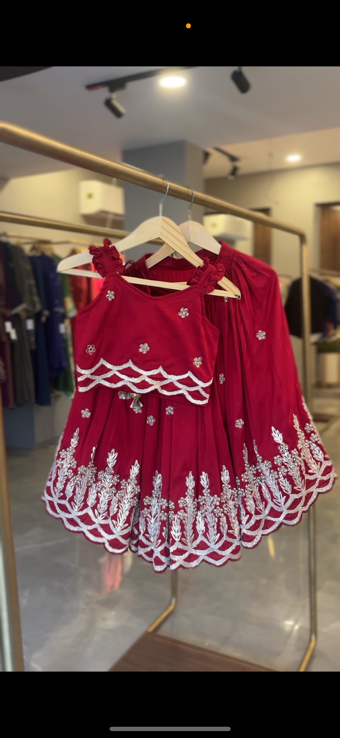 Embroidered Strappy Red Top And Pleated Lehenga