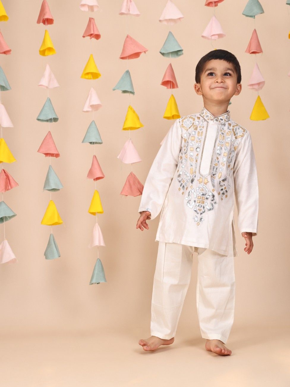 Silver and Golden Leather Embroidered Off White Kurta and Pant