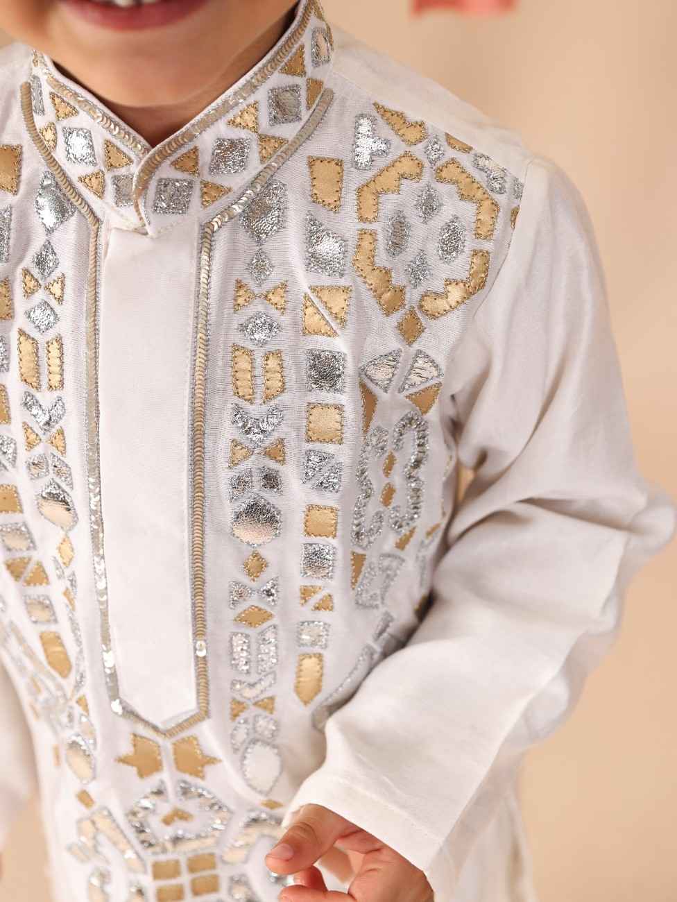 Silver and Golden Leather Embroidered Off White Kurta and Pant