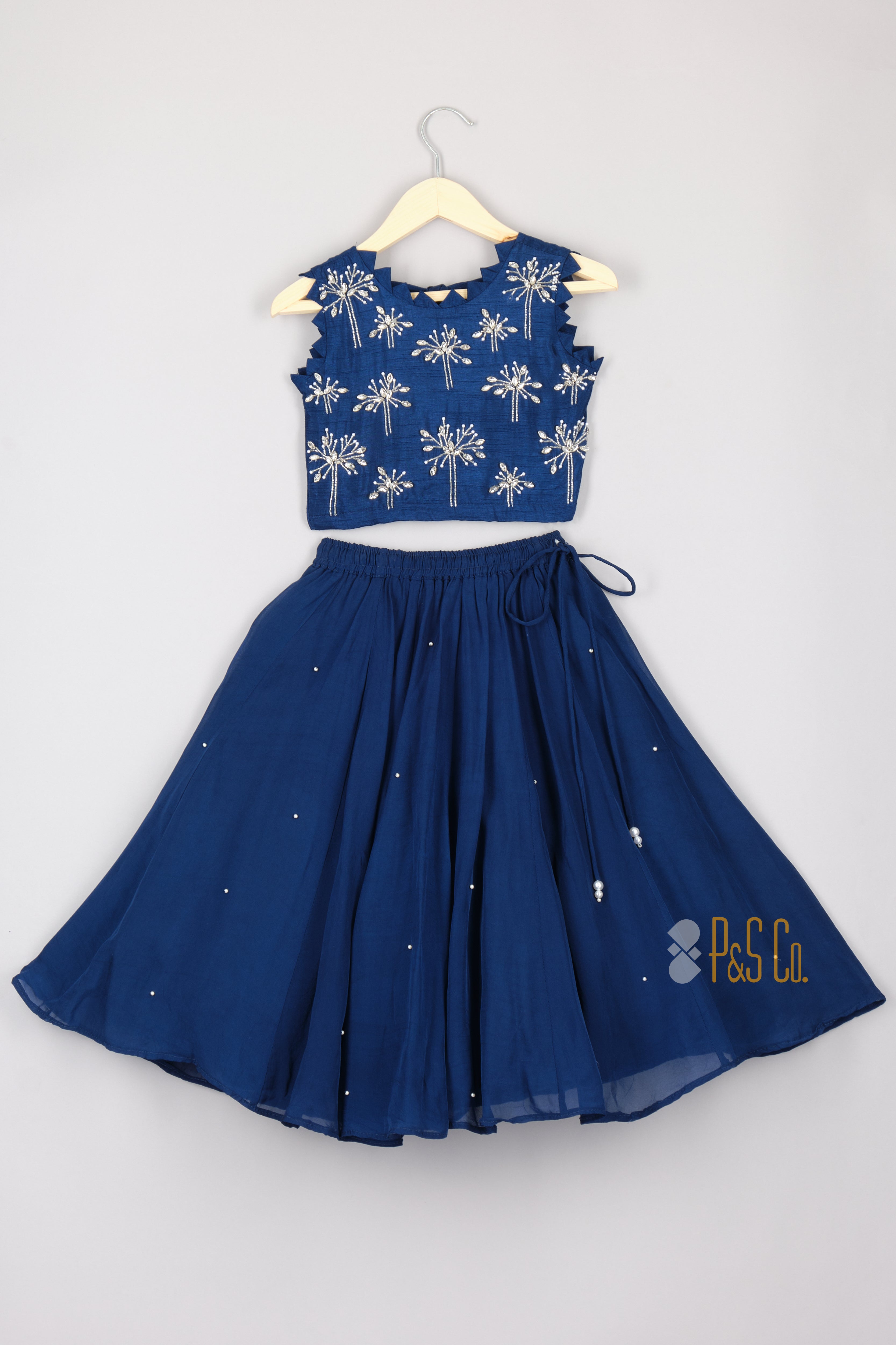 Royal Blue Elegant Leaf Shaped White Stones Embroidered Open Back Tie Up Top And Lehenga