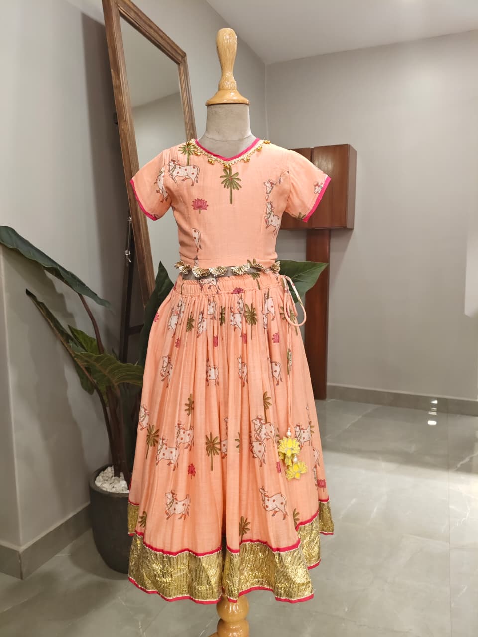 Adorable Printed Top With Fringed Detailing And Lehenga