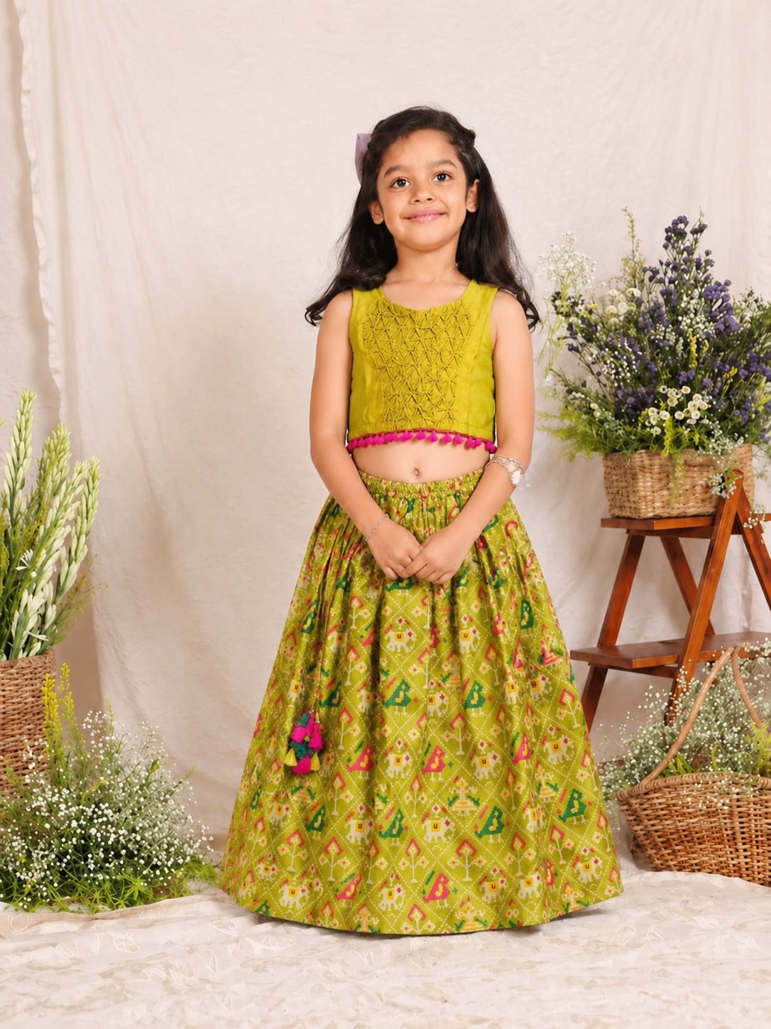 GREEN PATOLA GHAGARA WITH SMOCKED TOP